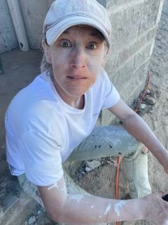 OP Construction & Development crew finishing drywall mud on a job site