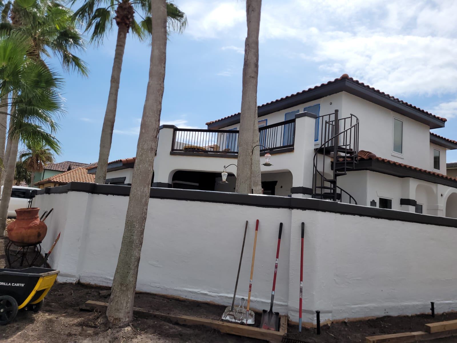 Mediterranean-style stucco home with tile roof