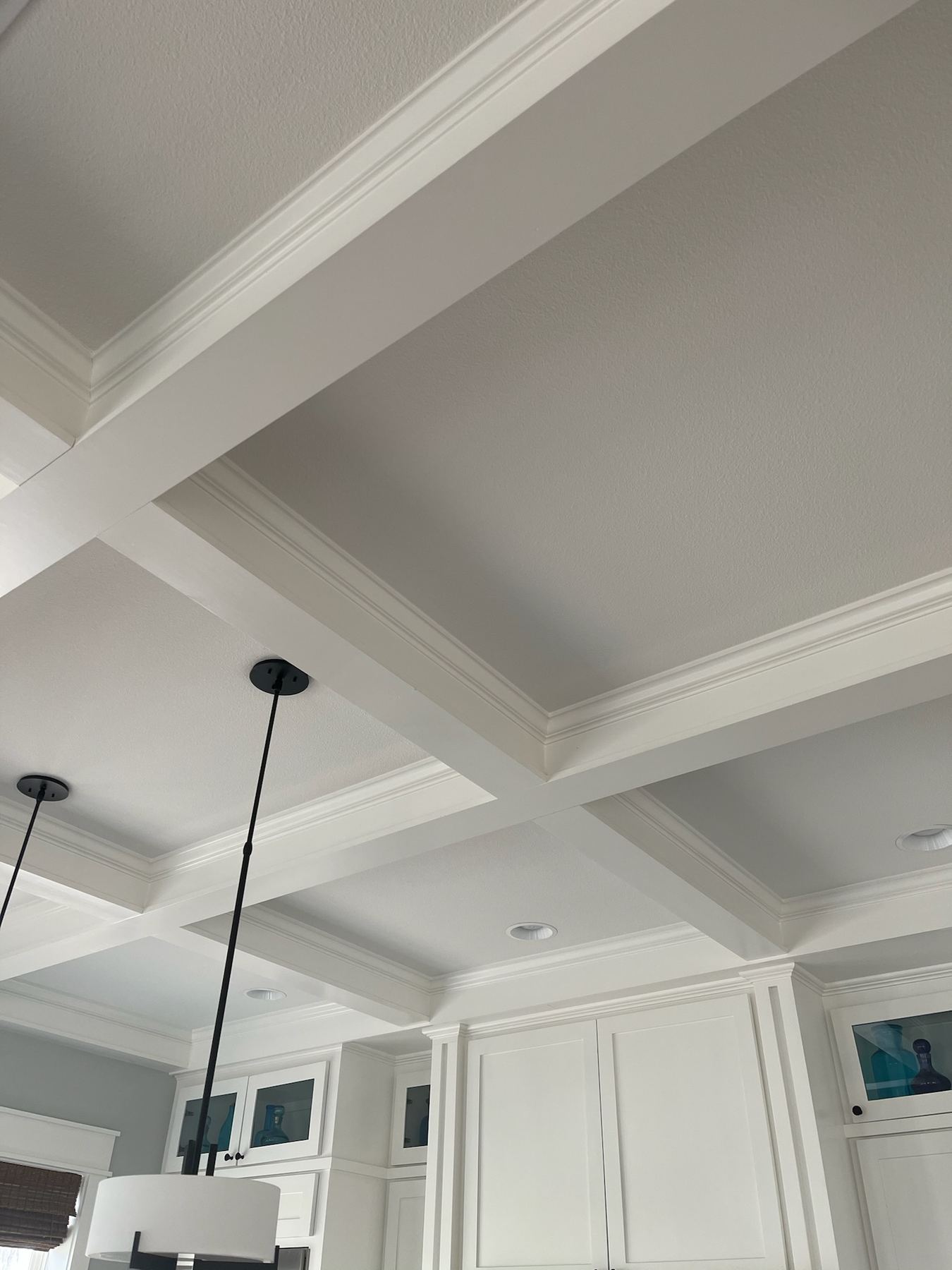 Vaulted wood-beam ceiling in great room renovation