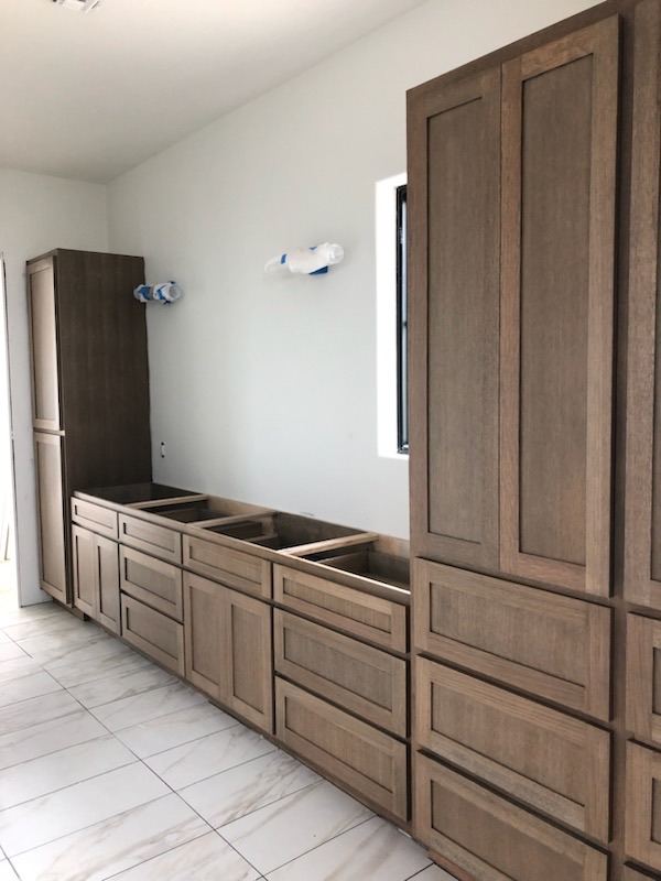 Kitchen remodel with dark wood cabinetry